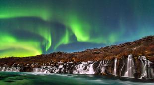 aurora_borealis_over_hraunfossar_iceland